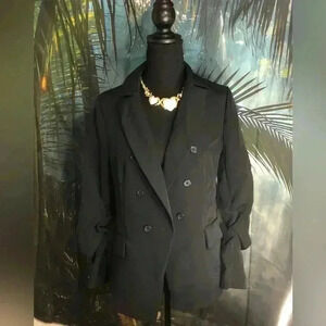 Women’s black blazer with rouched sleeves